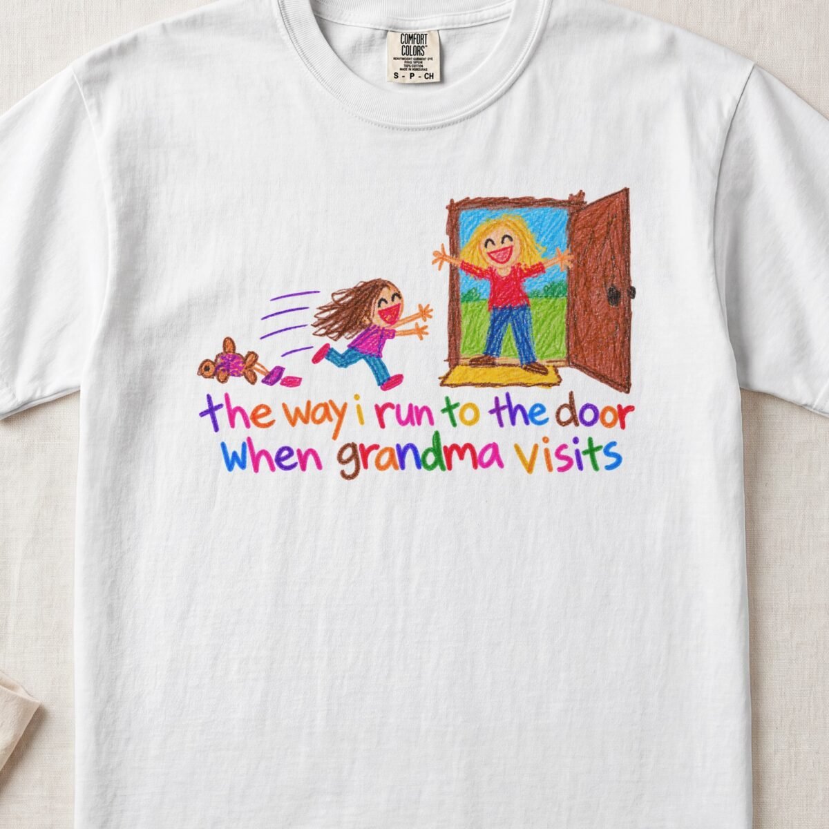The Way I Run To The Door When Grandma Visits Tee — Little Hands Tee on Comfort Colors 1717